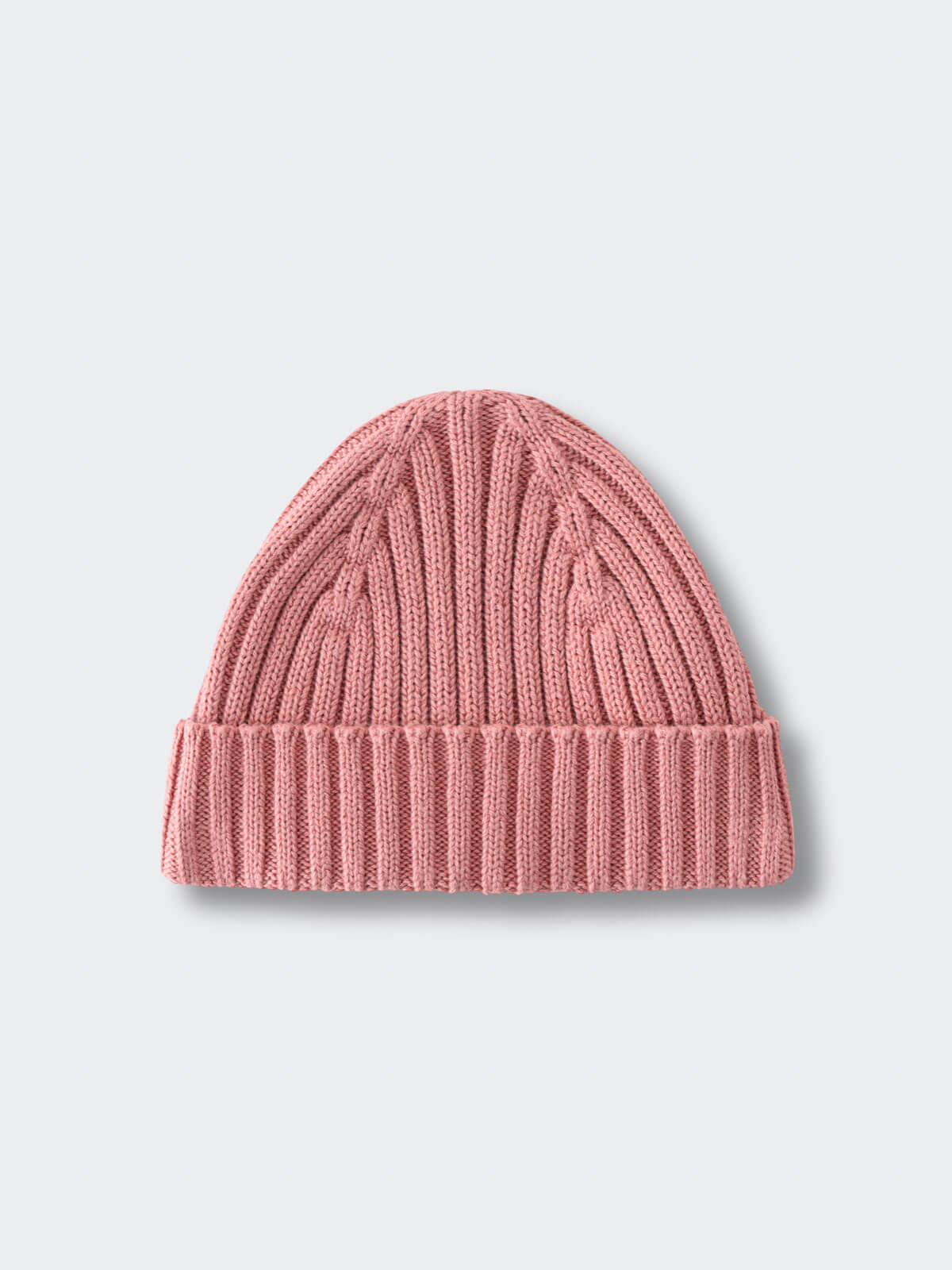 Pink knit beanie on a light gray background Baby Ribbed Beanie - Rosehip Baby girl