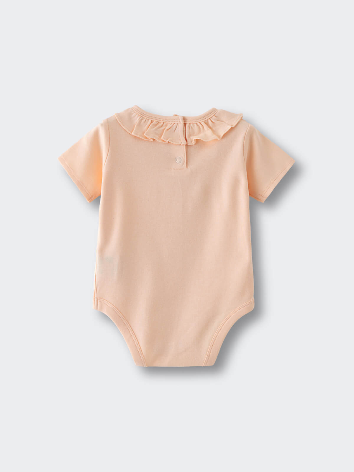 Baby bodysuit in peach color with ruffled collar and short sleeves laid flat Olivia Short Sleeve Bodysuit - Apricot Baby girl