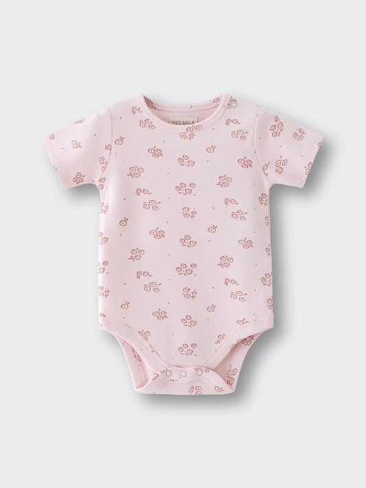 Light pink baby bodysuit with small floral print pattern throughout Printed Short Sleeve Bodysuit - Daisy Chain Baby girl
