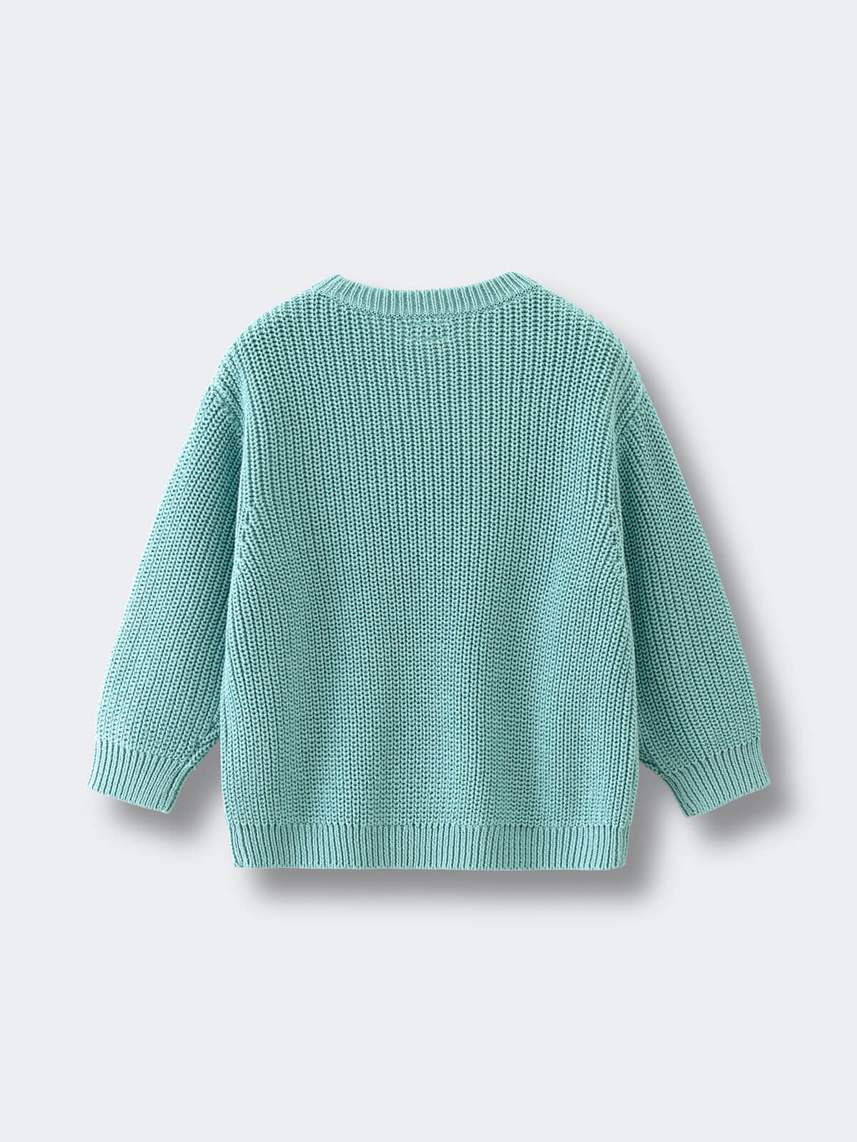 Teal knitted sweater on a light gray background