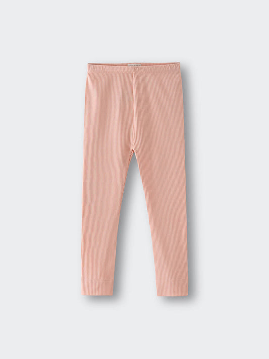 Ribbed peach-colored leggings laid flat on a light gray background ribbed Leggings - Toasted Peach Girls