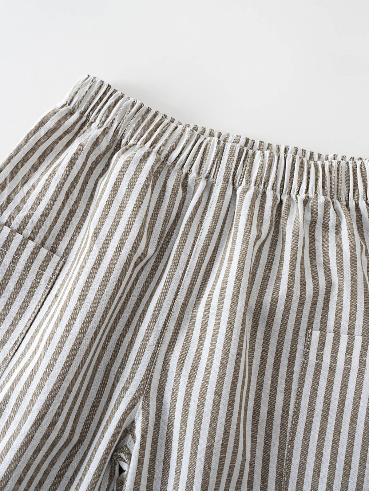 Close-up of striped elastic waistband pants in brown and white Striped Pants - Matcha Stripe Boys