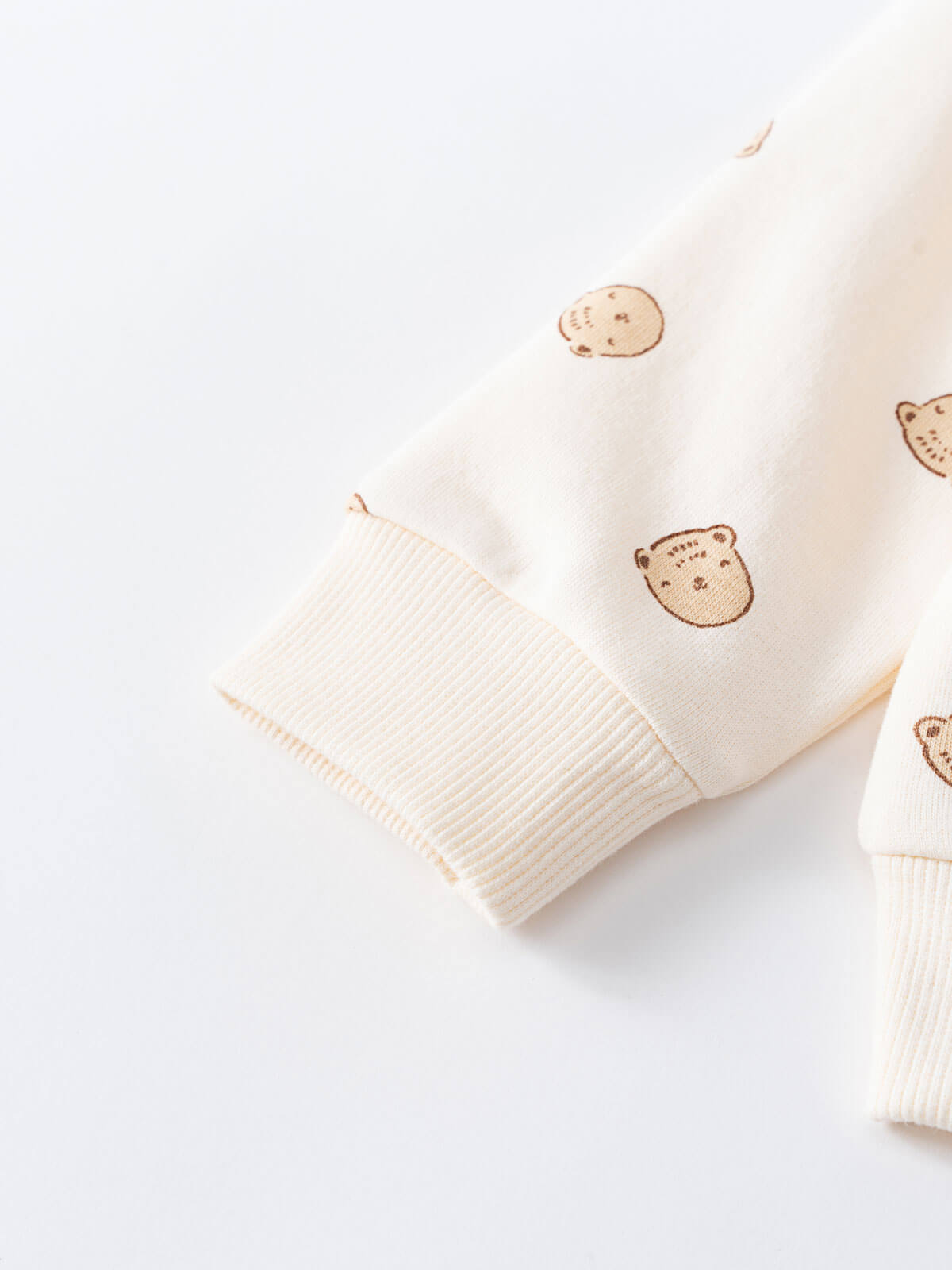 Close-up of cream fabric with small bear print and ribbed cuff Baby Printed Sweatshirt - Cosy Bear Ecru Baby boy