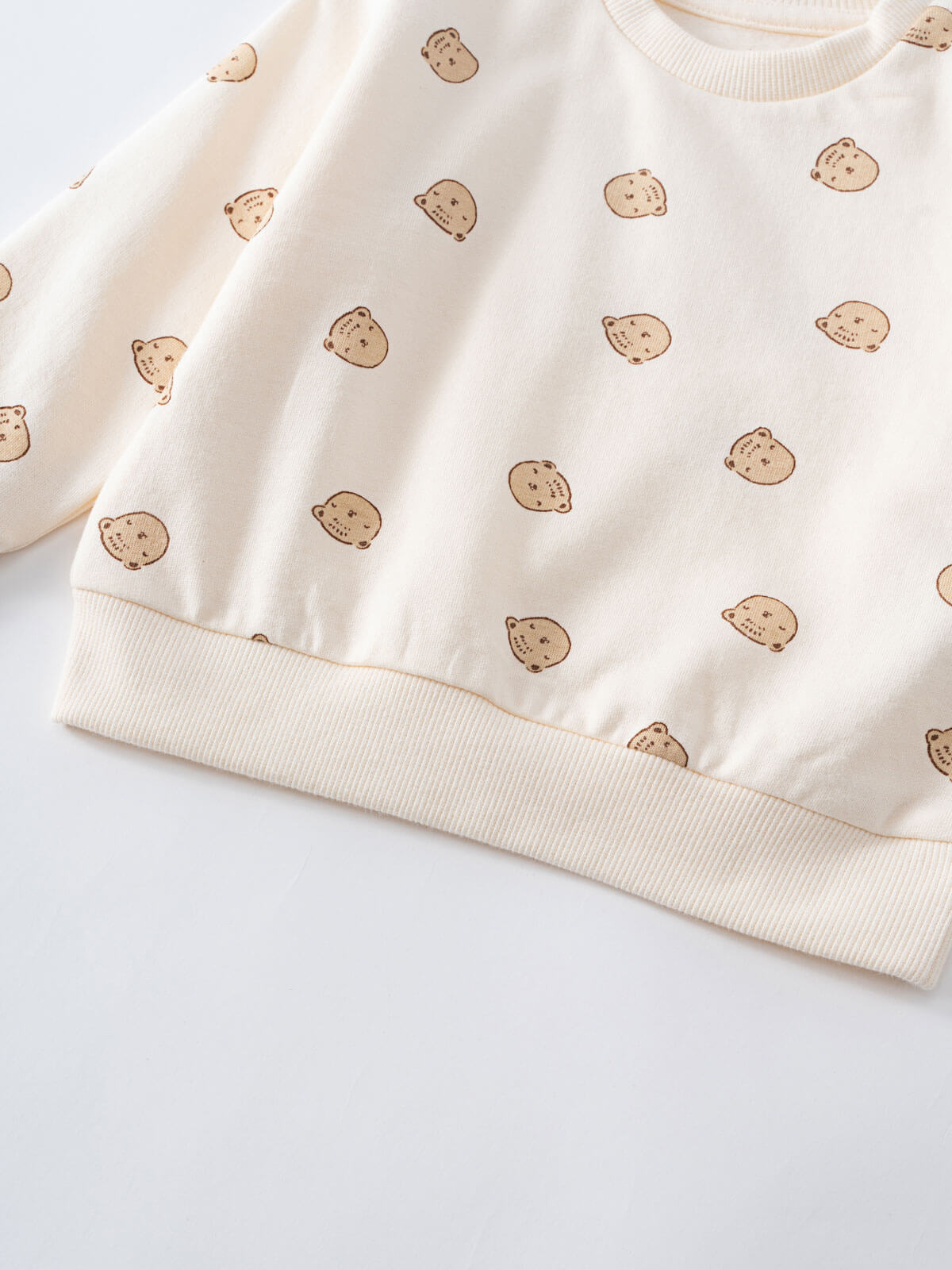 Close-up of cream sweatshirt with brown bear print and ribbed trim Baby Printed Sweatshirt - Cosy Bear Ecru Baby boy