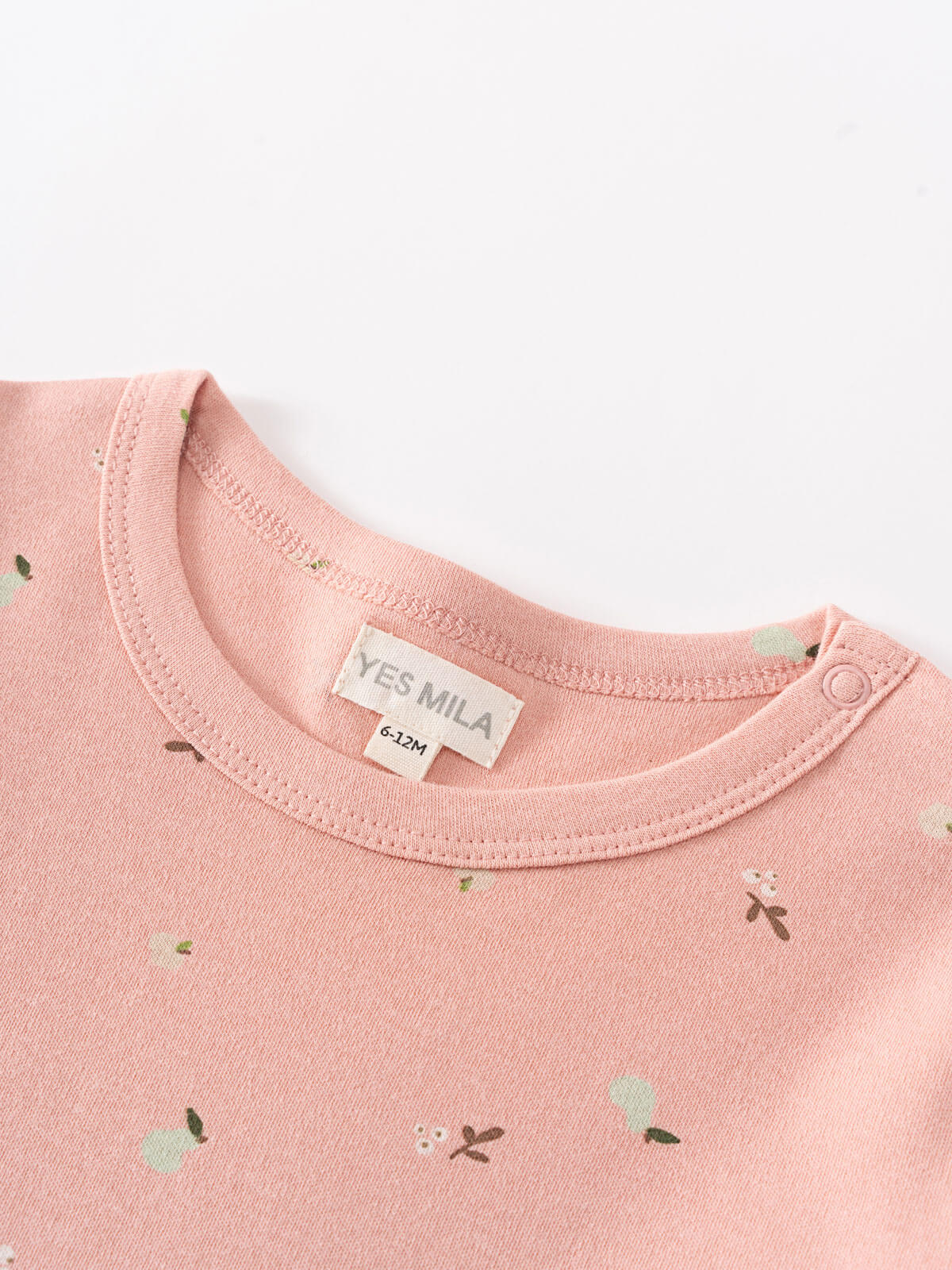 Pink baby sweater with small patterns on a light gray background Baby Printed Long Sleeve Tee - Autumn Harvest Rosehip Baby girl
