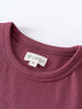 Close-up of a mauve t-shirt neckline with white label showing size 4Y Feature Print Short Sleeve Tee - Forest Gathering Girls