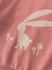 Close-up of a pink sweatshirt with a white rabbit and mushroom design Feature Print Sweatshirt - Forest Gathering Girls