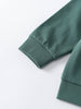 Close-up of sage green sweatshirt sleeves showing ribbed cuffs Feature Print Sweatshirt - Wild Baby boy