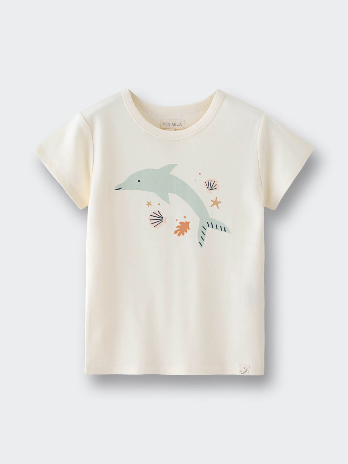 Cream colored children's t-shirt with dolphin and seashell graphic design Feature Print Short Sleeve Tee - Dolphin Short Sleeve Tee Shirt - Dolphin Girls