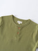 Close-up of an olive green henley shirt with two brown buttons Henley Short Sleeve Tee - Moss Boys