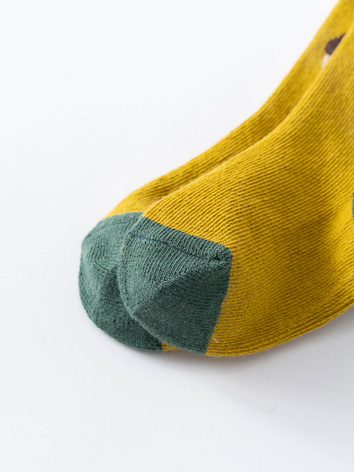 Close-up of a yellow sock with green heel and toe section Kids Socks 3 Pack - Acorn Boys