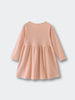 Back view of a peach-colored long sleeve dress with gathered skirt Long Sleeve Jersey Dress - Mallow Girls