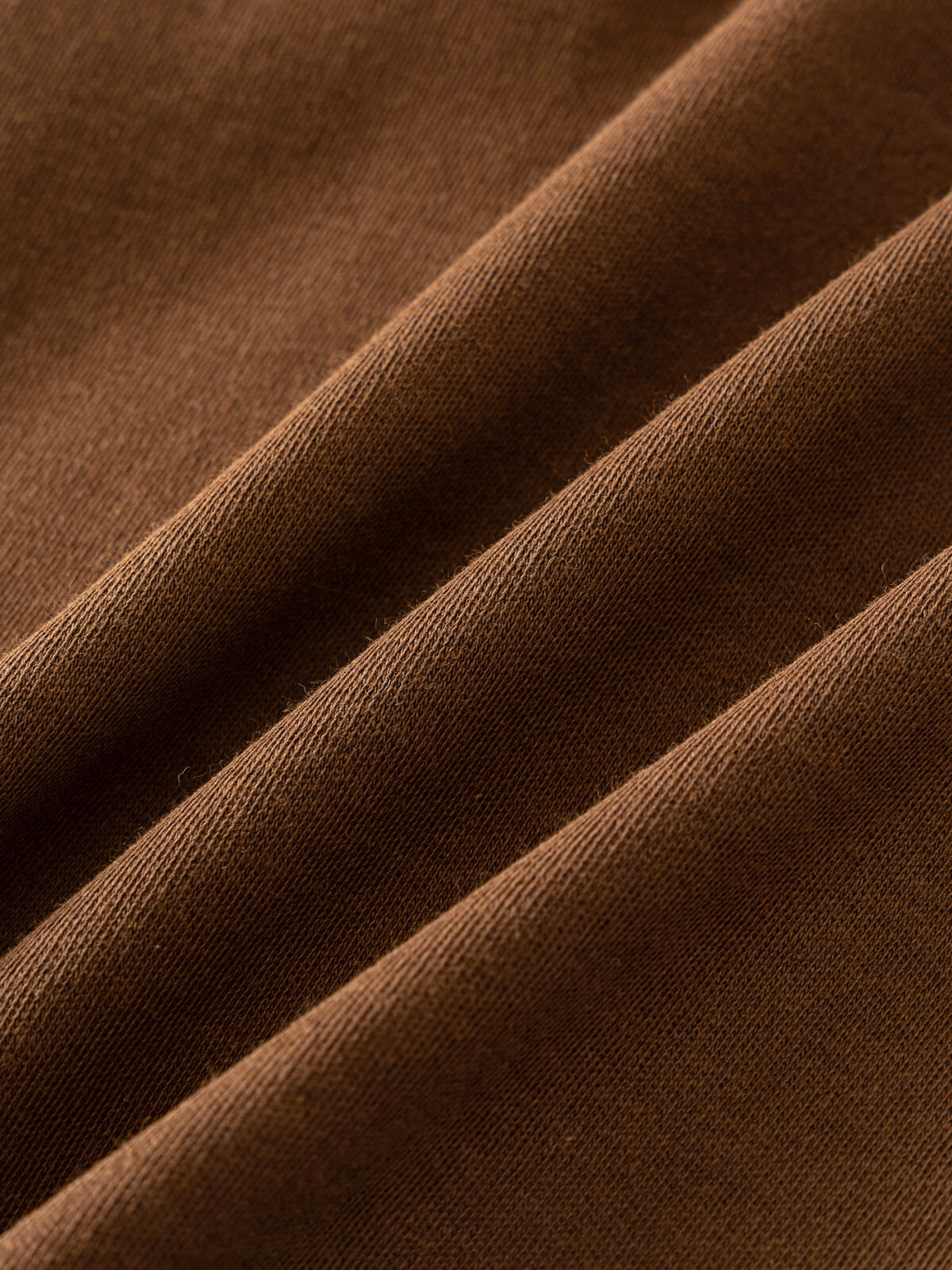 Close-up of brown ribbed fabric with diagonal folds and texture Long Sleeve Tee - Spruce Boys