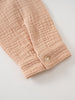 Close-up of a beige textured fabric sleeve cuff with a button fastening Muslin Long Sleeve Shirt - Sand Boys
