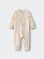 Beige baby onesie on a light gray background Pointelle Long Sleeve One Piece - Ecru Baby boy