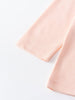Close-up of pale pink long sleeve shirt cuffs with hemstitched detail Printed Long Sleeve Tee - Dove Girls