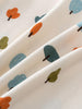 White fabric with small printed trees in orange, blue, and green colors Printed Short Sleeve Tee - Forest Adventure Ecru Boys