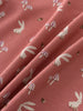 Close-up of coral pink fabric with mushroom and rabbit print pattern Printed Short Sleeve Tee - Forest Gathering Rosehip Girls