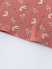 Close-up of coral fabric with white rabbits, mushrooms, and hedgehogs printed pattern Printed Short Sleeve Tee - Forest Gathering Rosehip Girls