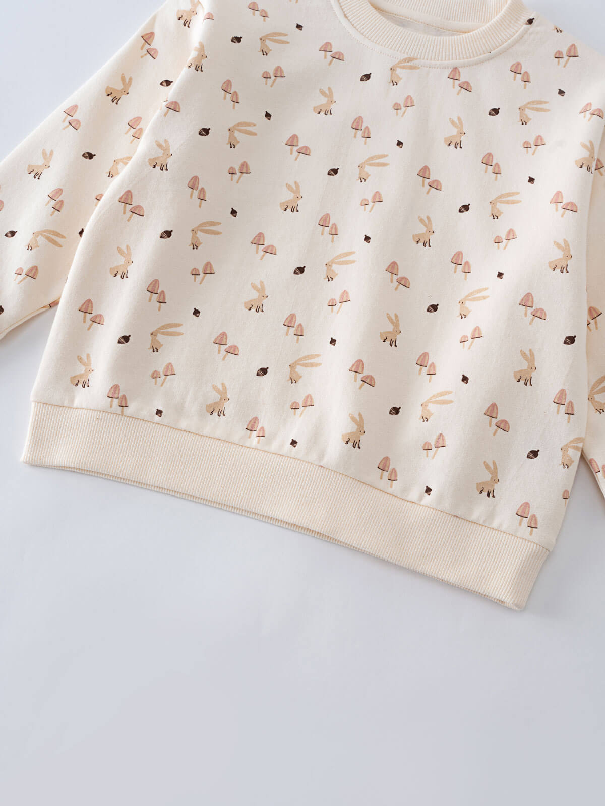 Close-up of cream sweatshirt with small rabbits and mushrooms pattern Printed Sweatshirt - Forest Gathering Ecru Girls