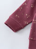 Close-up of mauve sweatshirt sleeve with small floral print and ribbed cuff Printed Sweatshirt - Wild Meadow Plum Jam Girls