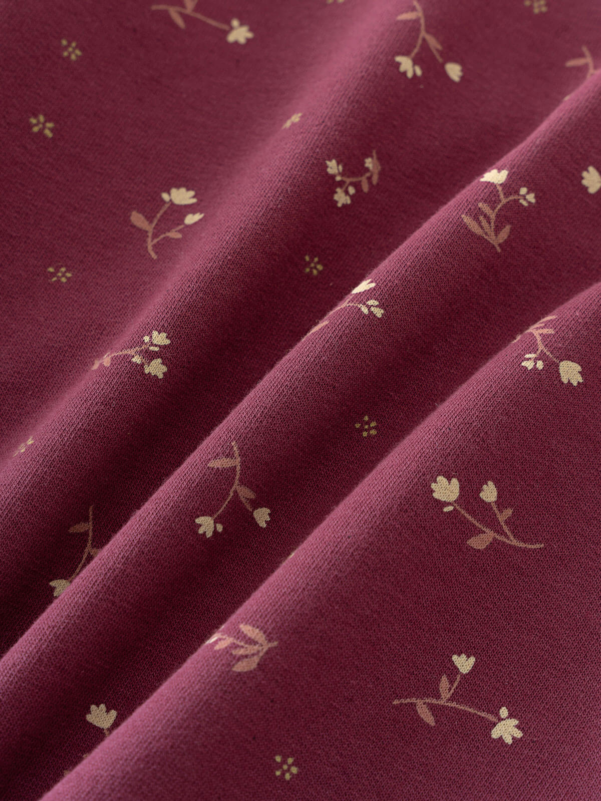 Deep pink fabric with delicate floral print pattern in soft folds Printed Sweatshirt - Wild Meadow Plum Jam Girls