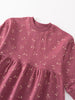 Close-up of a mauve sweatshirt dress with small floral print pattern Sweatshirt Dress - Wild Meadow Plum Jam Girls