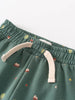 Close-up of green sweatpants waistband with cream drawstring and small printed pattern Printed Sweatpants - Mountain View Balsam Baby boy