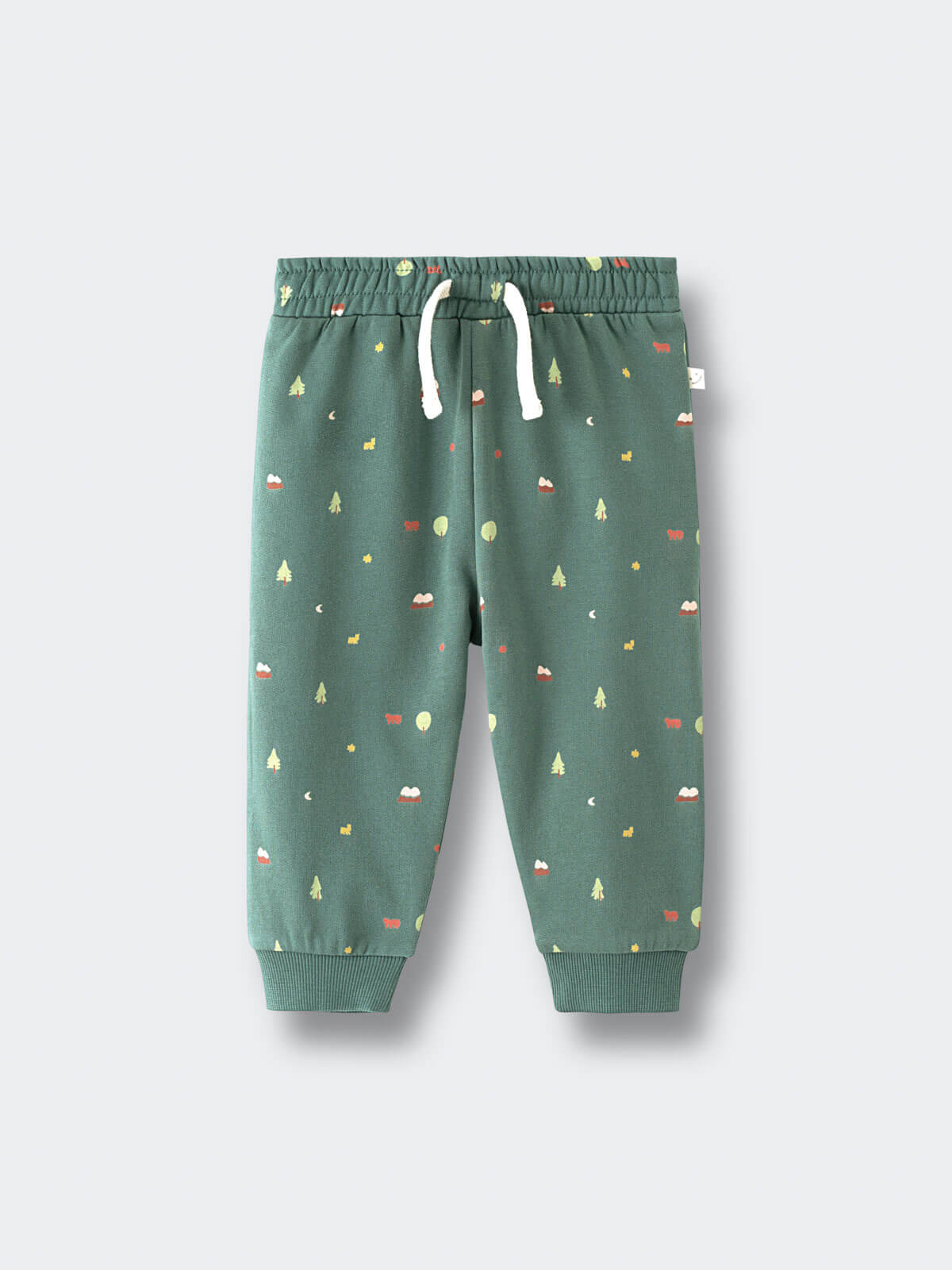 Green sweatpants with forest pattern and white drawstring on flat surface Printed Sweatpants - Mountain View Balsam Baby boy