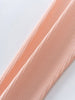 Close-up of ribbed peach-colored fabric showing texture and vertical lines Ribbed Leggings - Mallow Girls