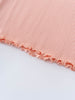 Close-up of pink ribbed fabric with ruffled lettuce edge trim Ribbed Long Sleeve Tee - Mallow Girls