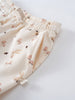 Close-up of cream elastic waistband with mushroom and bunny print pattern Sweatpants - Forest Gathering Ecru Girls