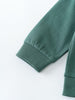 Close-up of a teal hoodie sleeve showing ribbed cuff detail Zip Hoodie - Balsam Boys