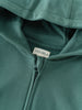 Close-up of a teal green zip hoodie with YES MILA label visible Zip Hoodie - Balsam Boys