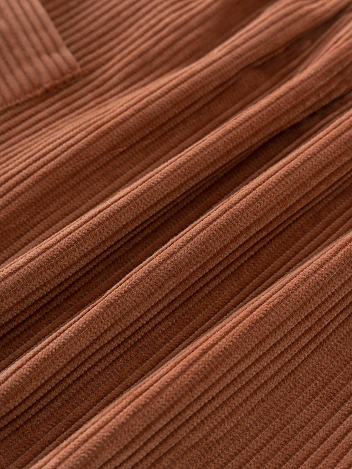 Close-up of brown corduroy dress fabric texture Baby Corduroy Dress - Russet Baby girl