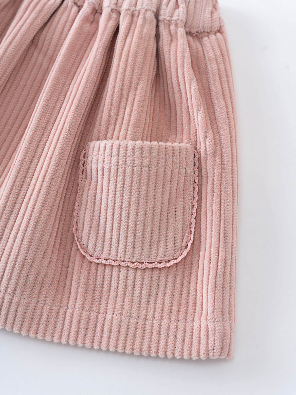 Pink corduroy skirt with a pocket on a white background Baby Corduroy Skirt - Blush Baby girl