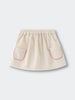 Beige corduroy skirt with two pockets on a light gray background Baby Corduroy Skirt - Ecru Baby girl
