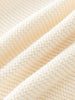 Close-up of beige knitted cotton fabric texture Baby Cotton Cardigan - Ecru Baby boy