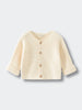 Beige baby knitted cotton cardigan on a light gray background Baby Cotton Cardigan - Ecru Baby boy