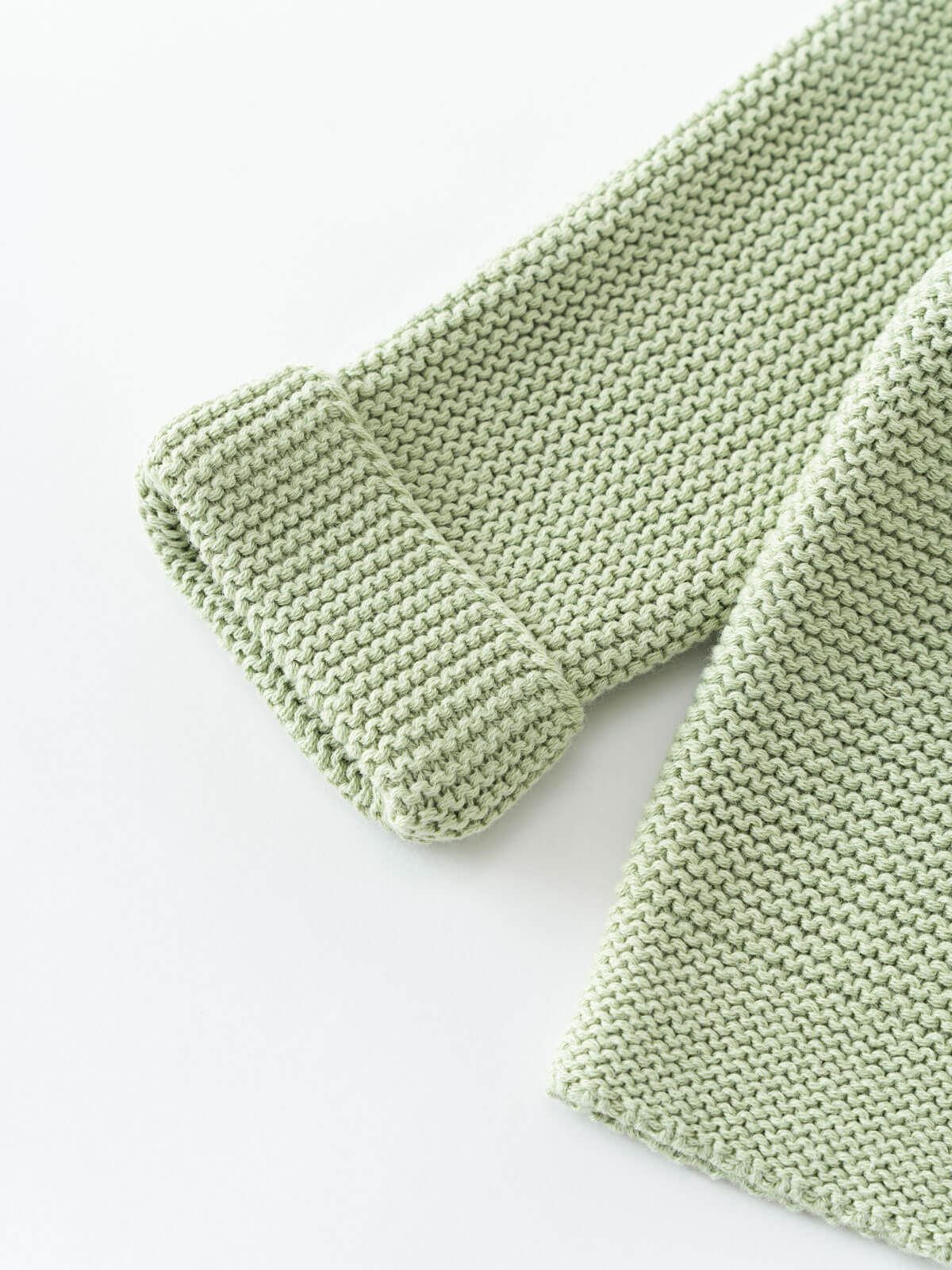 Green knitted cotton cardigan on a white background Baby Cotton Cardigan - Sage Baby boy
