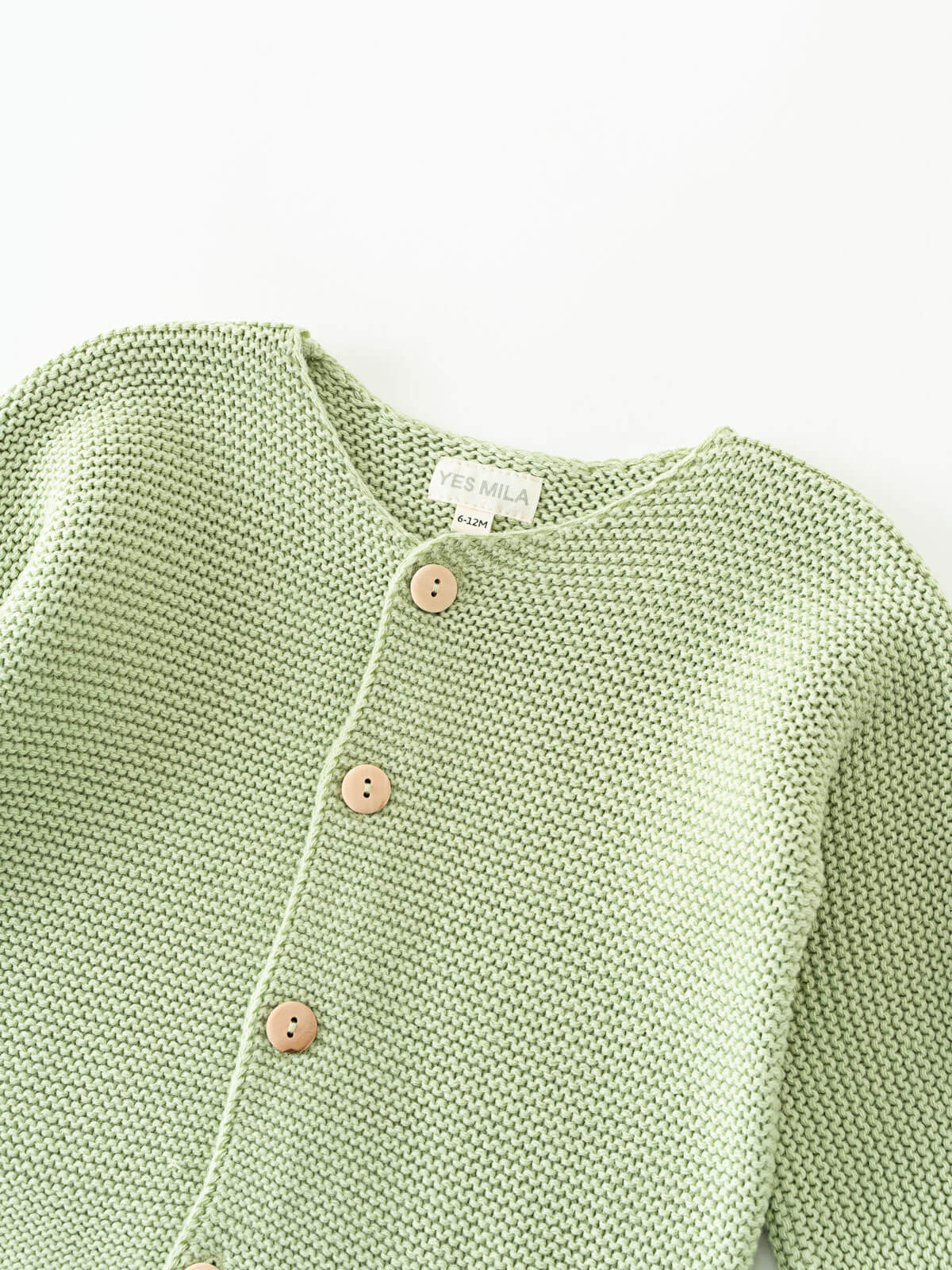 Green knitted cotton cardigan with buttons on a white background Baby Cotton Cardigan - Sage Baby boy
