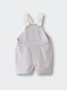 Striped baby overalls with cream straps and button details laid flat Baby Dungarees - Sand Stripe Baby boy