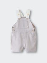 Striped baby overalls with cream straps and button details laid flat Baby Dungarees - Sand Stripe Baby boy