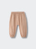 Beige ribbed baby pants with elastic waist and button detail Baby Muslin Pants - Sand Baby boy