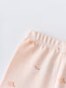 Close-up of pale pink fabric with small apple print pattern Baby Printed Leggings - Apples Baby girl