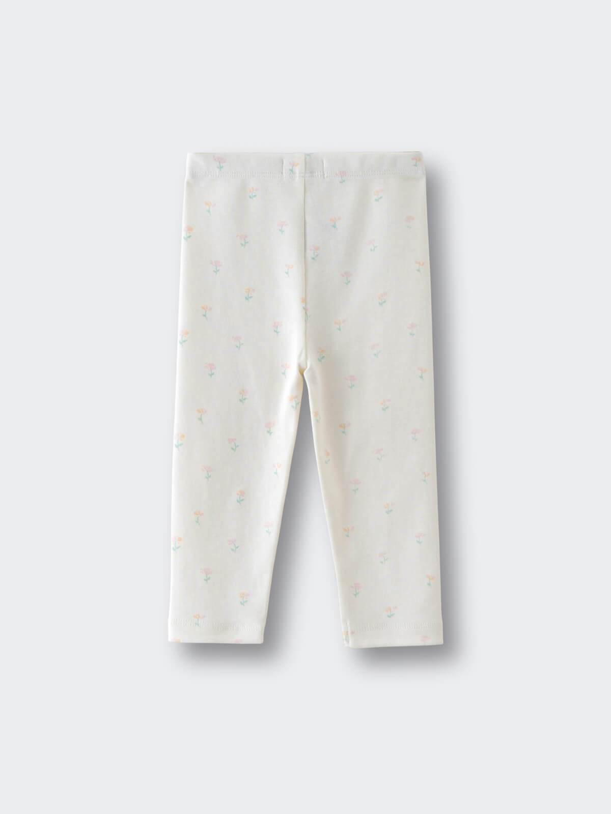 White leggings with small pastel floral print laid flat on light background Baby Printed Leggings- Spring Bloom Baby girl