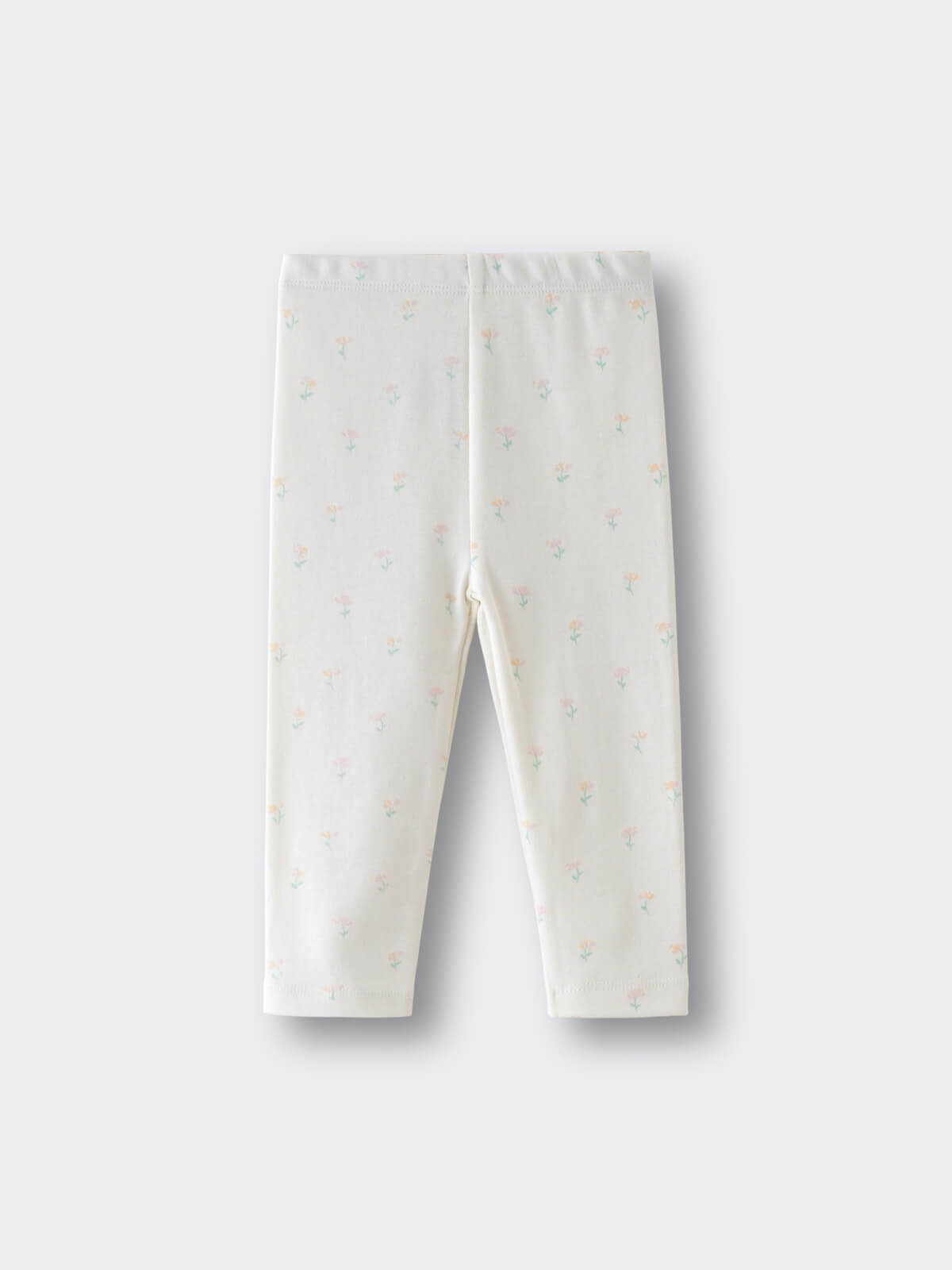 White leggings with small pastel floral print laid flat on a surface Baby Printed Leggings - Spring Bloom Baby girl