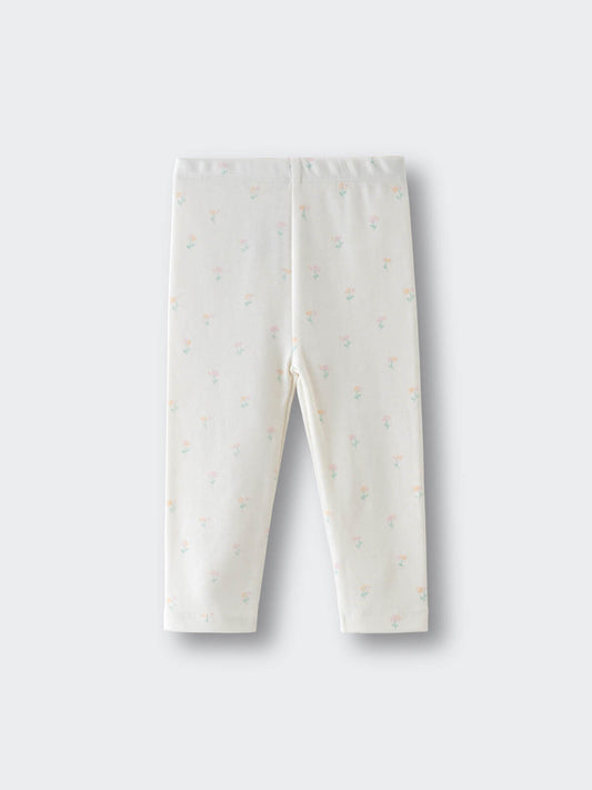 White leggings with small pastel floral print laid flat on a surface Baby Printed Leggings - Spring Bloom Baby girl