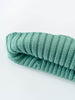 Folded teal knitted sock on a white background Baby Ribbed Beanie - Balsam Baby boy