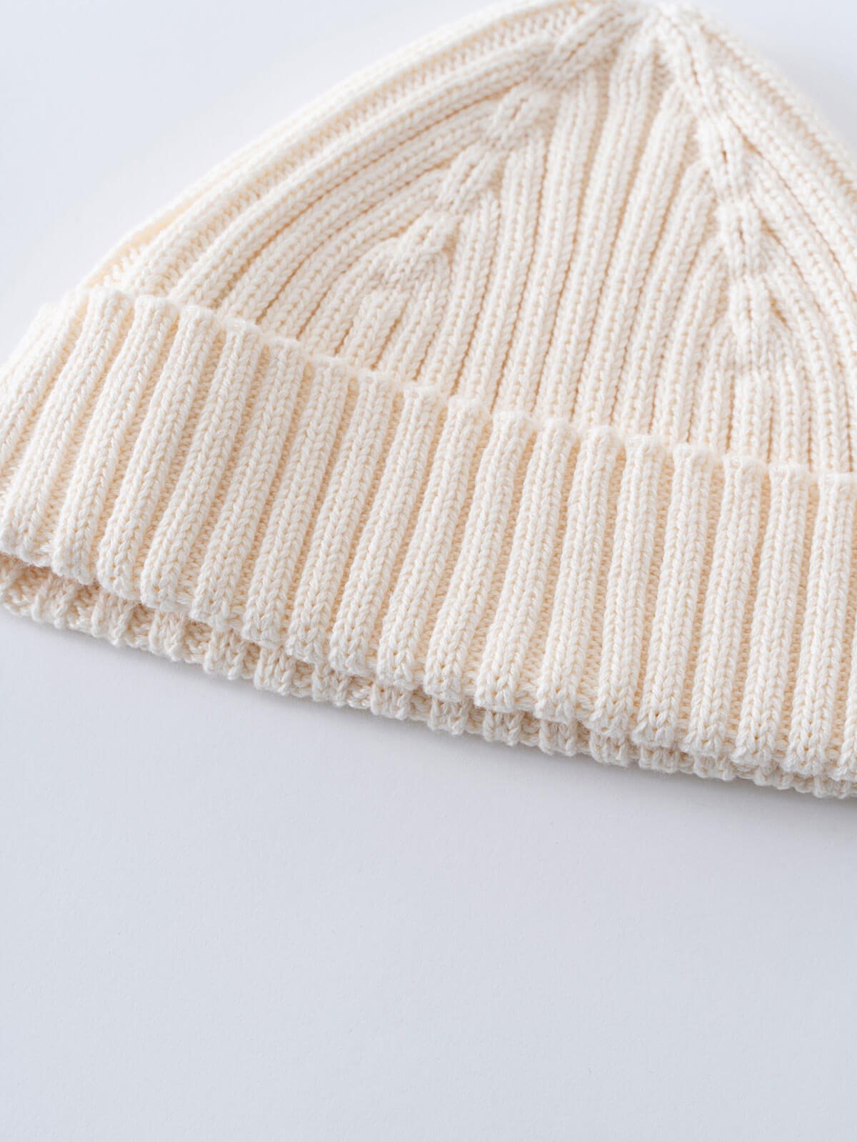 Beige knit beanie on a white background Baby Ribbed Beanie - Ecru Baby boy